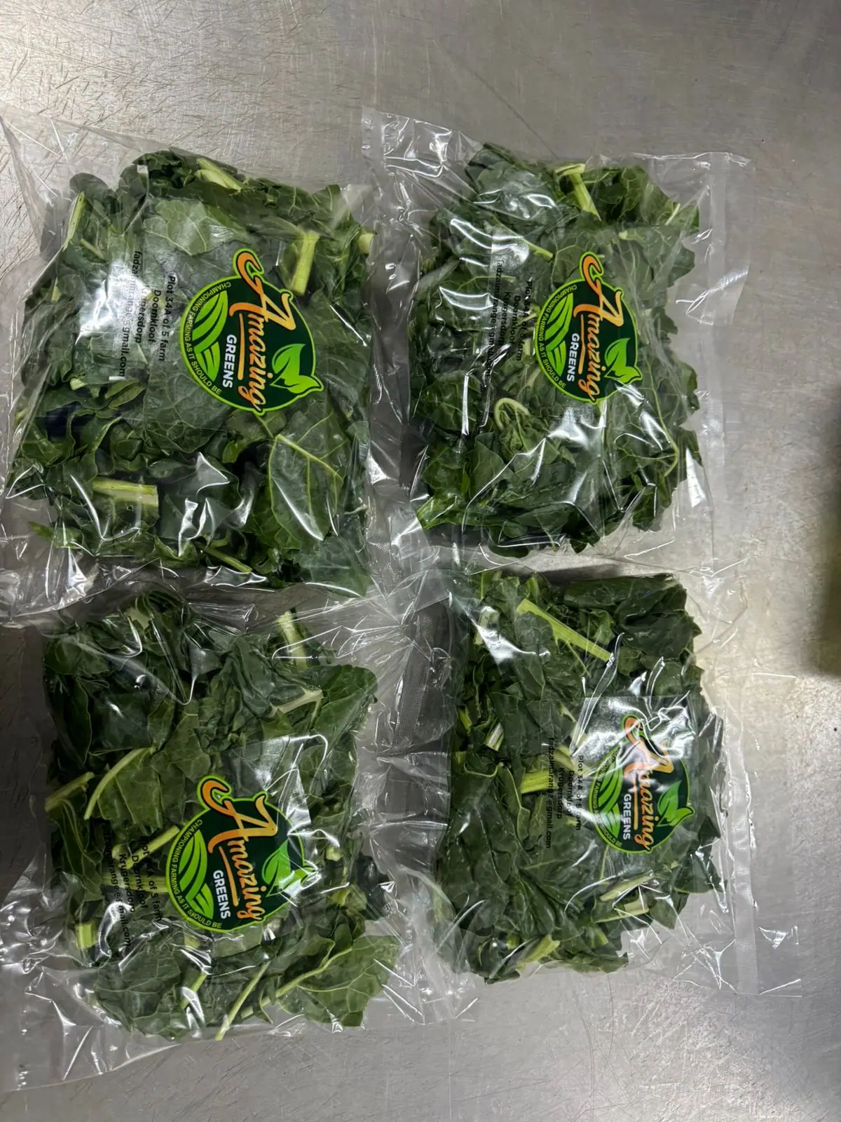 Baby spinach in branded Amazing Greens vacuum packs